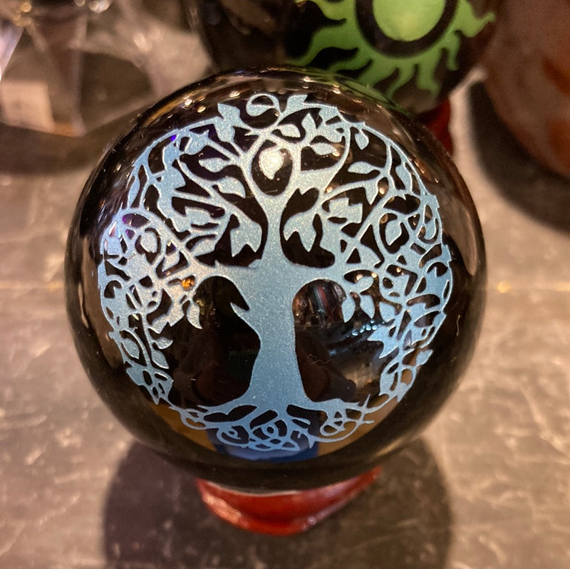 Black obsidian sphere with tree